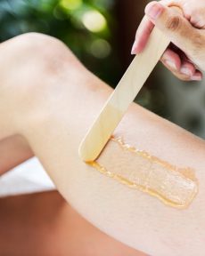 woman-getting-legs-waxed-spa woman-getting-legs-waxed-spa